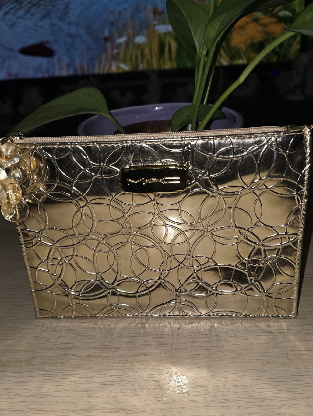 MAC Cosmetics Metallic Gold Cosmetic Pouch with Embossed Circle Design